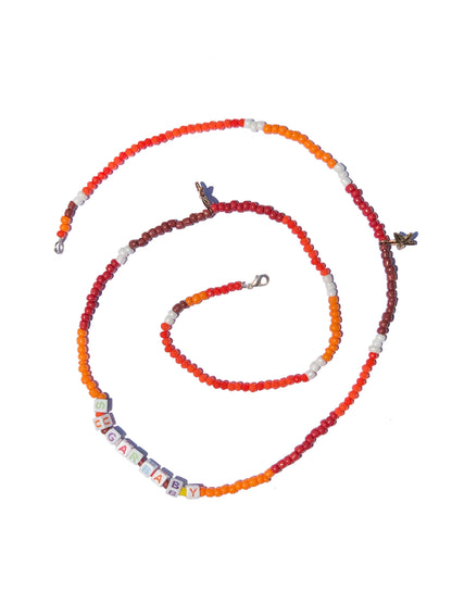 handcrafted orange, red, brown and white beaded belly chain with starfish charms and beaded letters.