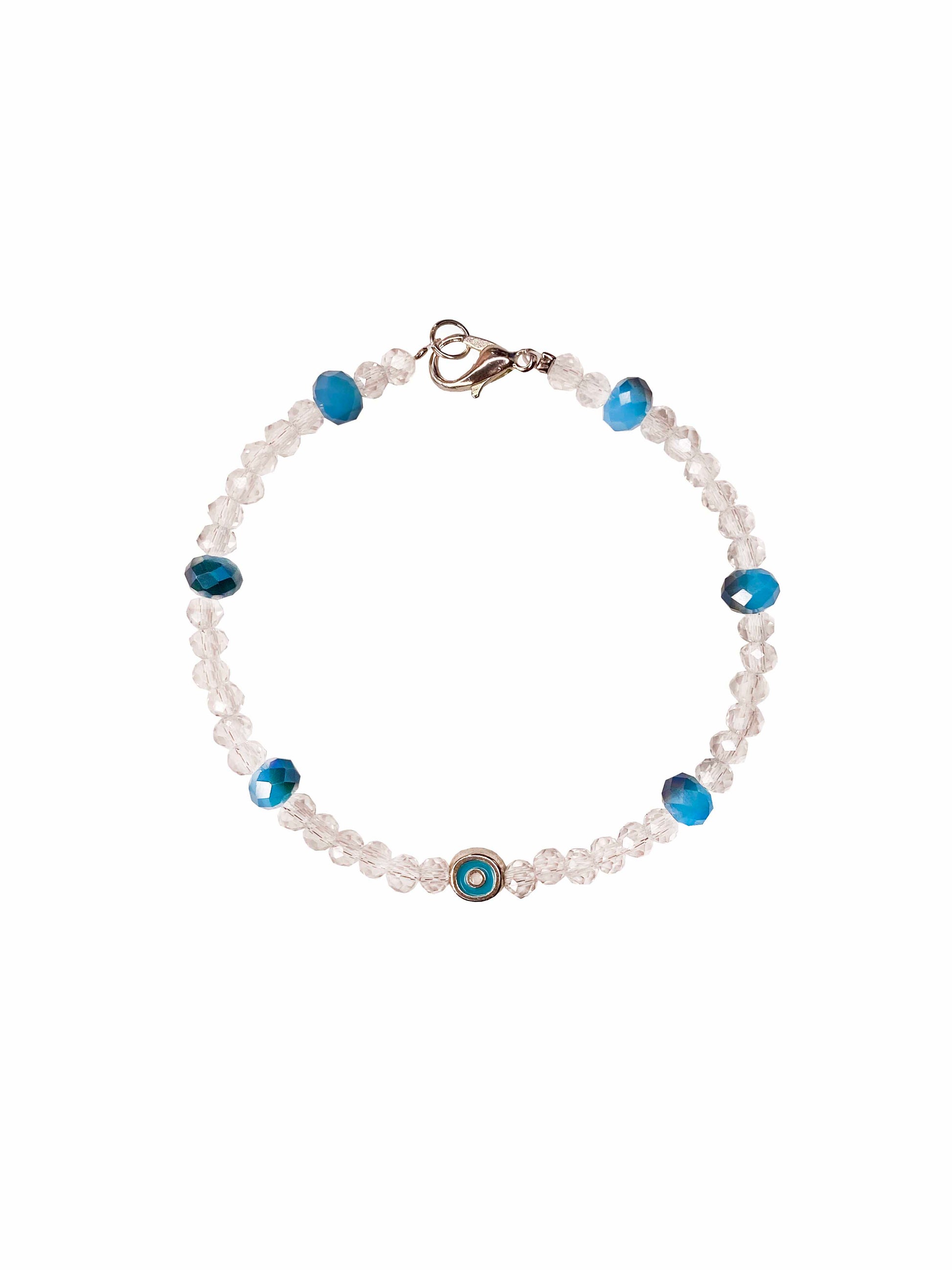 Handmade clear and blue crystal beaded bracelet with a silver backed blue evil eye charm.