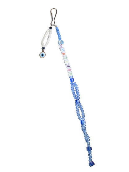 Blue and white crystal beaded bag charm with whatever spelled out using letter beads and an evil eye charm.