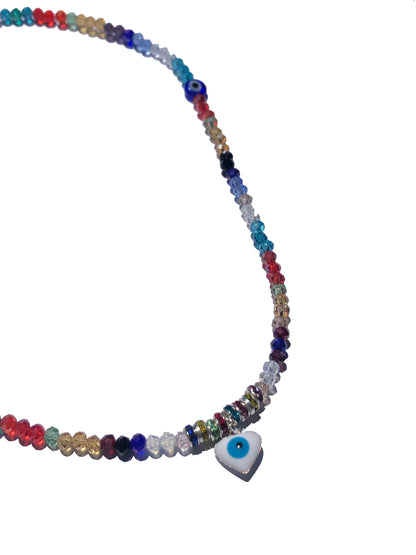 multicolored crystal beaded choker necklace with two circular blue evil eye charms, and a heart shaped evil eye pendant.